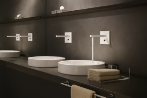 High-end commercial bathroom design with modern lighting, vanities, and touchless faucets