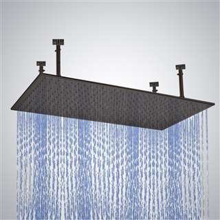 Modern bathroom with matte black shower head and neutral wall tile